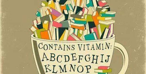 disegno di una tazza piena di libri e lettere dell'alfabeto